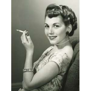 Elegant Woman Smoking Cigarette, Posing in Studio, Portrait 