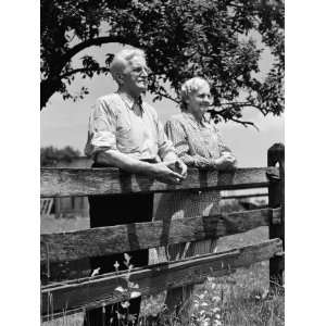  Elderly Couple on Farm Standing at Wooden Fence Looking Off 