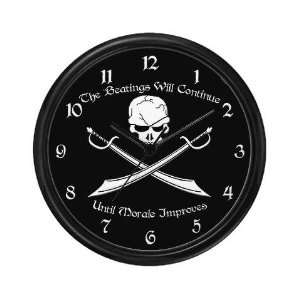  Morale Beatings Humor Wall Clock by  Everything 