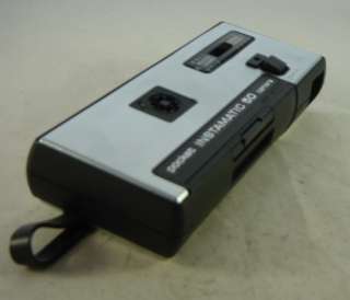 Kodak Pocket Instamatic 50 Camera with a case and a wrist strap