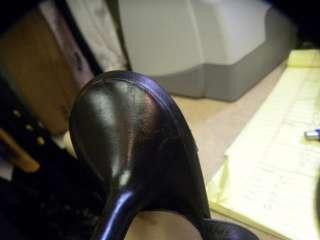   soles of shoes minor scuffing on back heel of shoes no biggy flaws
