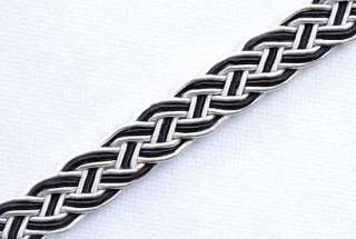An unusual trim made of bullion cords braided into a Celtic knot 