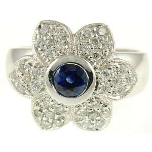 Magnificent Deep Blue Ceylon Sapphire & Diamond Flower ring in 18 kt 