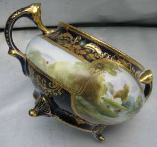 Antique Nippon Cobalt Creamer and Sugar with Man in Boat M in Wreath 