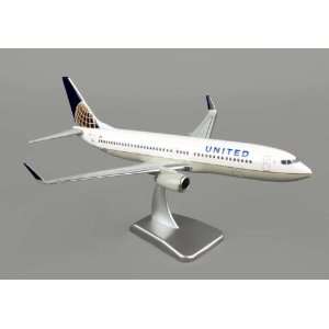   United 737 800 1/200 W/GEAR Post Co Merger Livery: Home & Kitchen