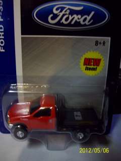   Ertl 1/64 red ford f 350 flatbed pickup truck dually 2 hitches  