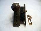salvaged antique mortise lock set with decorative bronze knobs and