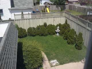 backyard patio and side deck downstairs hall stairs to attic