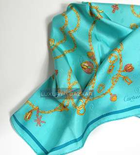 Cartier Links and Charms Scarf on Mint Green Background  