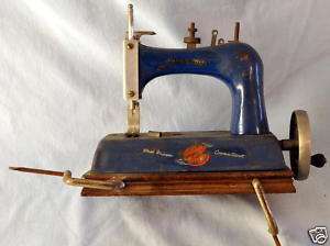 Artcraft Junior Miss Sewing Machine (tin on wood base)  