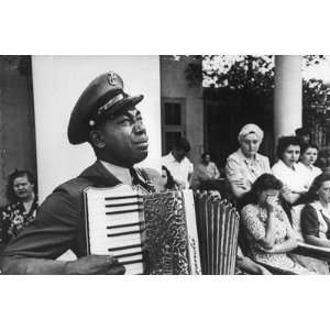 Navy CPO Graham Jackson Playing Accordian, Crying as Franklin D 