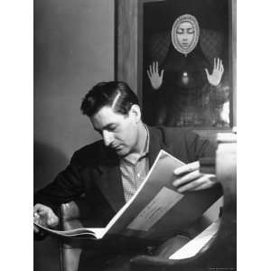  Gian Carlo Menotti Studying Score, Watched over by 