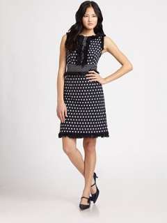   review playful polka dots and textural fringe trim decorate this