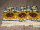 set of three sunflower print kitchen towels 