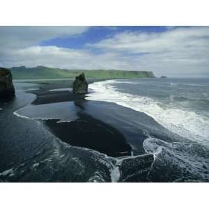  Black Volcanic Sand and Sea Stack at South Coast Bird Sanctuary 
